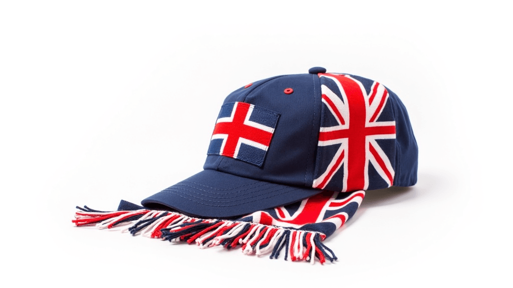A Union Jack scarf and cap arranged together against a white background